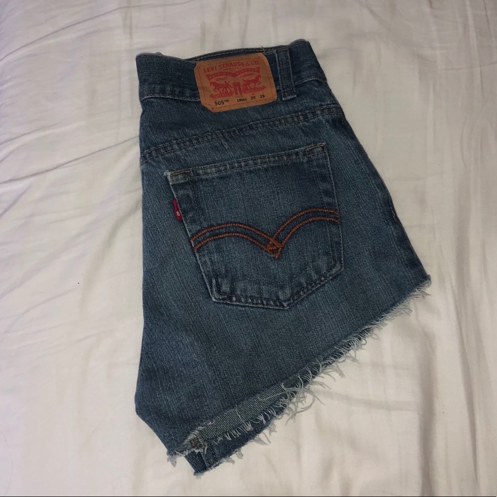 Medium wash Levi’s cutoff shorts